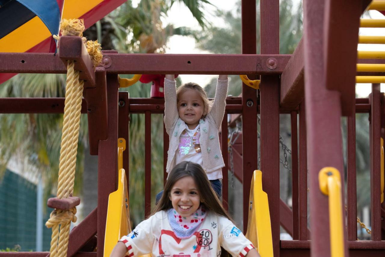 Jumeirah Messilah Beach Kuwait Кувейт Екстериор снимка Children playing at the park